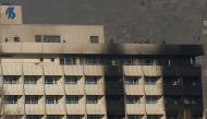 Afghan security forces are seen at the rooftop of the Intercontinental Hotel in Kabul, Afghanistan, January 21, 2018. REUTERS/Omar Sobhani
