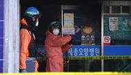 South Korean investigators inspect the scene of the January 26 hospital fire in Miryang on January 27, 2018. / AFP / JUNG Yeon-Je