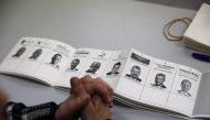 A ballot depicts the candidates for a presidential election at a polling station in Limassol, Cyprus January 28, 2018. REUTERS/Yiannis Kourtoglou	
