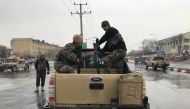 Afghan national army soldiers arrive near the Marshal Fahim military academy after a series of explosions in Kabul, Afghanistan January 29, 2018. REUTERS/Mohammad Ismail	
