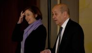 French Foreign Minister Jean-Yves Le Drian (R) chats with Defence Minister Florence Parly (L)  in Tokyo on January 26, 2018. / AFP / Toru YAMANAKA