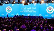 Attendees wait for the start of a plenary session at the Congress of Syrian National Dialogue in Sochi on January 30, 2018. / AFP / Alexander NEMENOV
