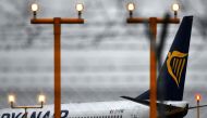 (FILES) This file photo taken on December 15, 2017 shows a plane of Irish low-cost airline company Ryanair on the tarmac of Rome's Ciampino airport.  AFP / Alberto PIZZOLI