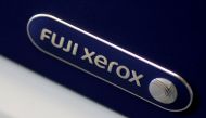 File photo of the Fuji Xerox logo is seen on a photocopier in this illustration photo January 19, 2018. REUTERS/Thomas White/Illustration/File Photo 