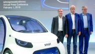 (L-R) Member of the board for finances Bodo Uebber, the CEO of German auto giant Daimler AG Dieter Zetsche and member of the board for busses and trucks Martin Daum, pose during the company's annual press conference in Stuttgart, southwestern Germany, on 