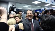Incumbent Nicos Anastasiades, presidential candidate of the right-wing Democratic Rally party greets his supporters at the campaign headquarters in Nicosia, Cyprus January 28, 2018. Reuters/Yiannis Kourtoglou