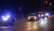 French police officers escort a convoy understood to be transporting Salah Abdeslam, the prime suspect in the November 2015 Paris attacks, from Fleury-Merogis prison in the southern suburbs of Paris, to the 