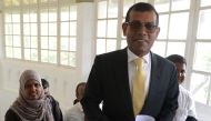 File photo of former President of the Maldives Mohamed Nasheed (C) arrives for a press conference in Colombo, January 22, 2018. / AFP / LAKRUWAN WANNIARACHCHI

