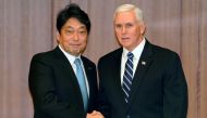 US Vice President Mike pence, right, poses with Japan's Defense Minister Itsunori Onodera prior to their meeting at Defense Ministry in Tokyo, Japan February 7, 2018. REUTERS/Shizuo Kambayashi/Poo