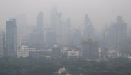 The skyline is seen through morning air pollution in Bangkok, Thailand February 8, 2018. REUTERS/Athit Perawongmetha