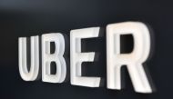 The Uber logo is seen outside the Uber Corporate Headquarters building in San Francisco, California on February 05, 2018.  AFP / JOSH EDELSON
