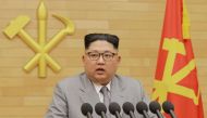 File picture of a picture North Korean leader Kim Jong-Un delivering a New Year's speech at an undisclosed location January 1, 2018. AFP PHOTO/KCNA VIA KNS