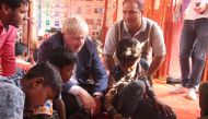 British Foreign Secretary Boris Johnson (C) meets with Rohingya refugees at a camp in Bangladesh's Cox's Bazar district on February 10, 2018. AFP 