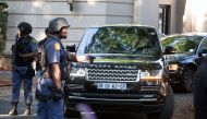 A police convoy leaves the home of the Gupta family in Johannesburg, South Africa, February 14, 2018. Reuters/James Oatway