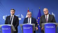 (FromL) Croatian Prime Minister Andrej Plenkovic, European Commission President Jean-Claude Juncker and EU Commissioner Neven Mimica address a press conference at the European Commission in Brussels on February 14, 2018. AFP / EMMANUEL DUNAND