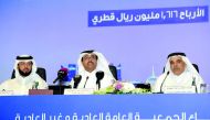 The Minister of Energy and Industry and Chairman of Qatar Electricity and Water Company (QEWC), H E Dr Mohammed bin Saleh Al Sada (centre); with Vice Chairman Khalid bin Said Al Rumaihi (left); and Managing Director, Fahad Hamad Al Mohannadi; attending th