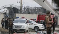 Afghan security officials inspect the explosion site in Kabul, Afghanistan on March 2, 2018.  Haroon Sabawoon - Anadolu
