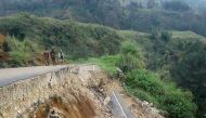 File photo shows damage to a road near Mendi in Papua New Guinea's highlands region after a 7.5-magnitude earthquake, February 27, 2018. / AFP / Melvin LEVONGO 