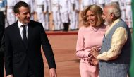 France's President Emmanuel Macron (L) looks at his wife Brigitte (C) and India's Prime Minister Narendra Modi during a ceremonial reception at the Indian Presidential Palace in New Delhi on March 10, 2018. (AFP / Money SHARMA)