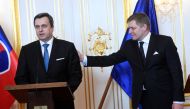 Speaker of the Slovakia's National Council Andrej Danko (L) and Slovakia's Prime Minister Robert Fico react after a meeting at the Bratislava castle, Bratislava, Slovakia March 9, 2018. REUTERS/Radovan Stoklasa
