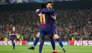 Barcelona's Ousmane Dembele celebrates with Lionel Messi after scoring their second goal. REUTERS
