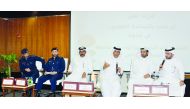 Ali Abdul Latif Al Misnad (third right), Board Member, Qatar Chamber addressing the seminar session along with other officials from various ministries.
