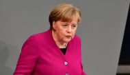 German Chancellor Angela Merkel delivers a speech to parliament on March 21, 2018 at the Bundestag (lower house of parliament) in Berlin. Merkel outlined her government's plans a week after being sworn in for a fourth term following six months of politica