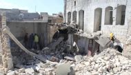 A collapsed building is seen after Assad Regime forces carried out an airstrike over the de-escalation zone of Maarrat al-Nu'man district of Idlib, Syria on March 17, 2018. Mohmad Adaher - Anadolu

