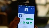 This photo illustration taken on March 22, 2018 shows apps for Facebook and other social networks on a smartphone in Chennai. / AFP / ARUN SANKAR
