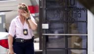 REPRESENTATIVE IMAGE: A law enforcement official wipes her eyes at the entrance to the shooting crime scene in Orlando, Florida on June 5, 2017 (AFP / Gregg Newton) 