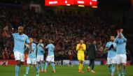 Manchester City players react at the final whistle during the UEFA Champions League first leg quarter-final football match between Liverpool and Manchester City, at Anfield stadium in Liverpool, north west England on April 4, 2018. / AFP / PAUL ELLIS