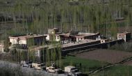 A general view shows the site of an attack by Taliban militants on a government compound in the Khwaja Omari district in the southeastern province of Ghazni on April 12, 2018. AFP / ZAKERIA HASHIMI