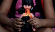 A child attends a protest against the rape of an eight-year-old girl, in Kathua, near Jammu and a teenager in Unnao, Uttar Pradesh state, in New Delhi, India April 15, 2018. REUTERS/Cathal McNaughton 