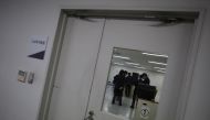 File photot of guards at the East Japan Immigration Center standing inside a processing room at the center in Ushiku, Ibaraki prefecture, Japan, March 19, 2015. REUTERS/Yuya Shino/File Photo