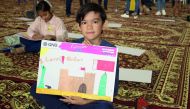 The children participating in the Expressions drawing competition. Pic: Abdul Basit/The Peninsula