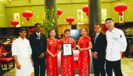 The Radisson Blu Hotel Doha staff with the award.