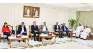 Mohamed bin Ahmed bin Towar Al Kuwari (second right), Vice-Chairman, Qatar Chamber, and Saleh bin Hamad Al Sharqi (right), Director-General, Qatar Chamber, with visiting MUSIAD delegation, at Qatar Chamber premises.