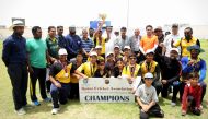 Qatar Cricket Association (QCA) President Yousef Jeham Al Kuwari and other officials with Stallions Cricket Academy players after they won the QCA Under-14 school tournament at the Asian Town Cricket Stadium.