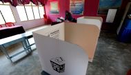 An election volunteer works a day before the 14th general election at a polling station in Alor Setar, Kedah state, Malaysia May 8, 2018. REUTERS/Lai Seng Sin