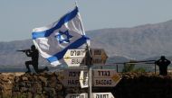 An Israeli flag is seen placed on Mount Bental in the Israeli-annexed Golan Heights on May 10, 2018.  AFP / Jalaa Marey