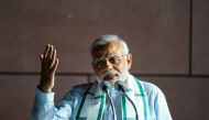 Indian Prime Minister Narendra Modi addresses party supporters during a celebration event ahead of wining the Karnataka election in New Delhi on May 15, 2018. / AFP / CHANDAN KHANNA