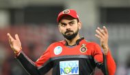 Royal Challengers Bangalore captain Virat Kohli reacts during the 2018 Indian Premier League (IPL) Twenty20 cricket match between Kings XI Punjab and Royal Challengers Bangalore at the Holkar Cricket Stadium in Indore on May 14, 2018. GETTYOUT / AFP / PUN