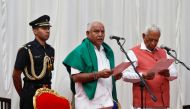 India's ruling Bharatiya Janata Party (BJP) leader B. S. Yeddyurappa is administered the oath as Chief Minister of the southern state of Karnataka by Governor Vajubhai Vala inside the Governor's house in Bengaluru, India, May 17, 2018. Reuters/Abhishek N.