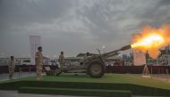 Officials fire Midfaal Iftar, an old tradition during holy Ramadan to announce breaking of fast, at the Katara Cultural Village. 
