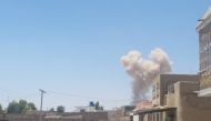 A cloud of smoke is seen after an explosion in Kandahar, Afghanistan May 22, 2018 in this picture obtained from social media. AZEEM ZMARIAL
