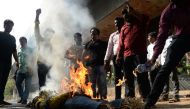 Indian protesters burn an effigy of Vedanta Resources Executive Chairman Anil Agarwal during a protest in Chennai on May 22, 2018, condemning the killings of protesters during a demonstration in the south Indian city of Tuticorin held to demand the closur