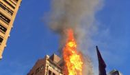 Flames can be seen coming from a building on fire in Sydney's central business district in Australia, May 31, 2018. Zorry Coates/via REUTERS 