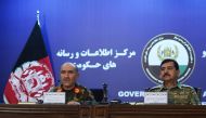 Afghan Army Chief of Staff, General Sharif Yaftali (L) and Deputy Minister, General Akhtar Mohammad Ibrahimi (R) look on during a press conference in Kabul on June 7, 2018. (AFP / WAKIL KOHSAR)