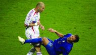 In this file photo taken on July 09, 2006 shows French midfielder Zinedine Zidane (L) gesturing after head-butting Italian defender Marco Materazzi during the World Cup 2006 final football match between Italy and France at Berlin’s Olympic Stadium.  AFP /