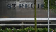 Policemen patrol outside the St. Regis hotel premises ahead of the US-North Korea summit in Singapore on June 10, 2018. AFP / ADEK BERRY
 